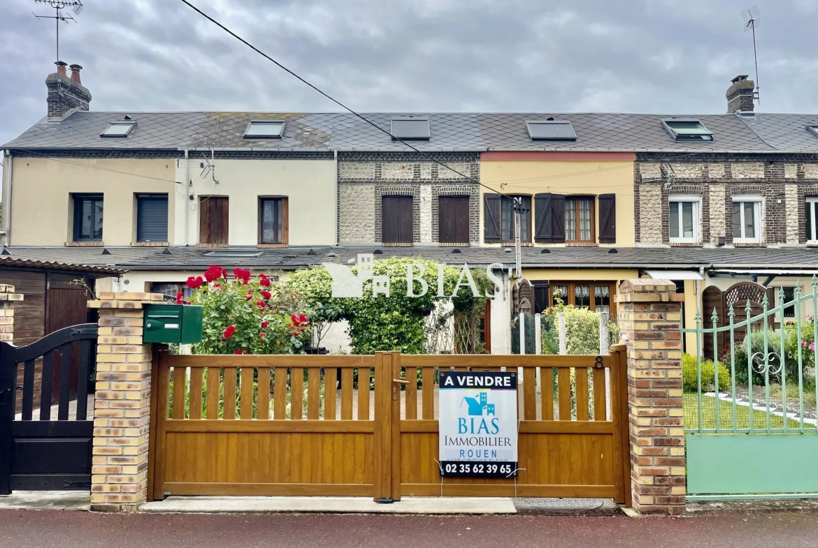 Maison mitoyenne de 65 m² à Le Petit-Quevilly avec terrasse et cave 
