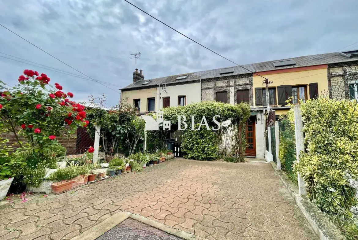 Maison mitoyenne de 65 m² à Le Petit-Quevilly avec terrasse et cave 