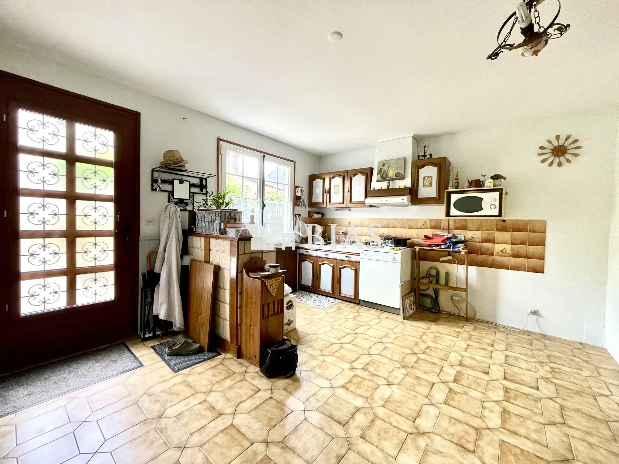 Maison mitoyenne de 65 m² à Le Petit-Quevilly avec terrasse et cave 