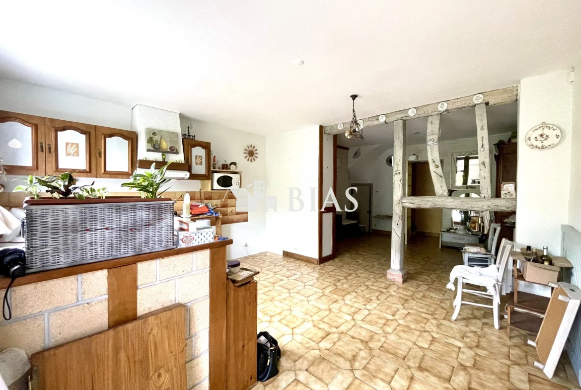 Maison mitoyenne de 65 m² à Le Petit-Quevilly avec terrasse et cave 