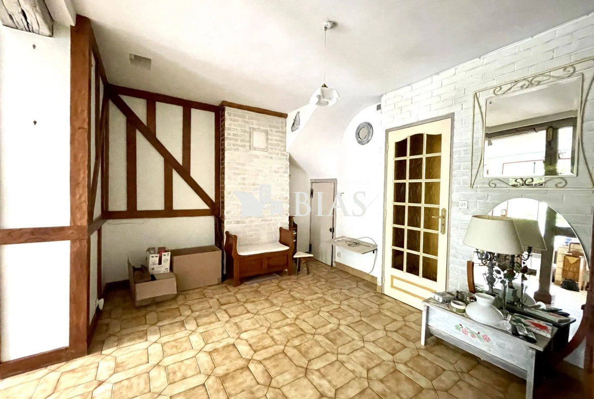 Maison mitoyenne de 65 m² à Le Petit-Quevilly avec terrasse et cave 