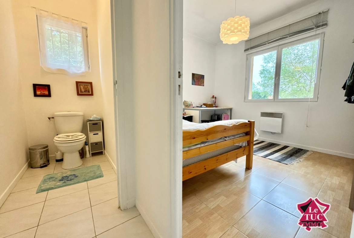 Maison familiale moderne avec jardin et garage à Ledat près de Villeneuve-sur-Lot 