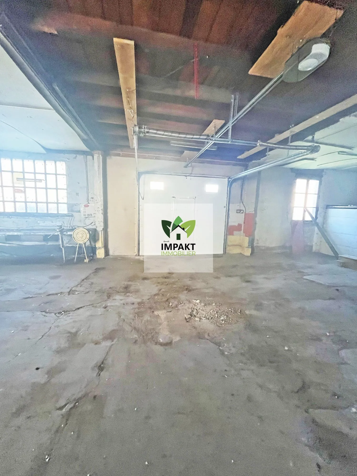 Maison à rénover avec grand garage et potentiel professionnel à Ronchamp 