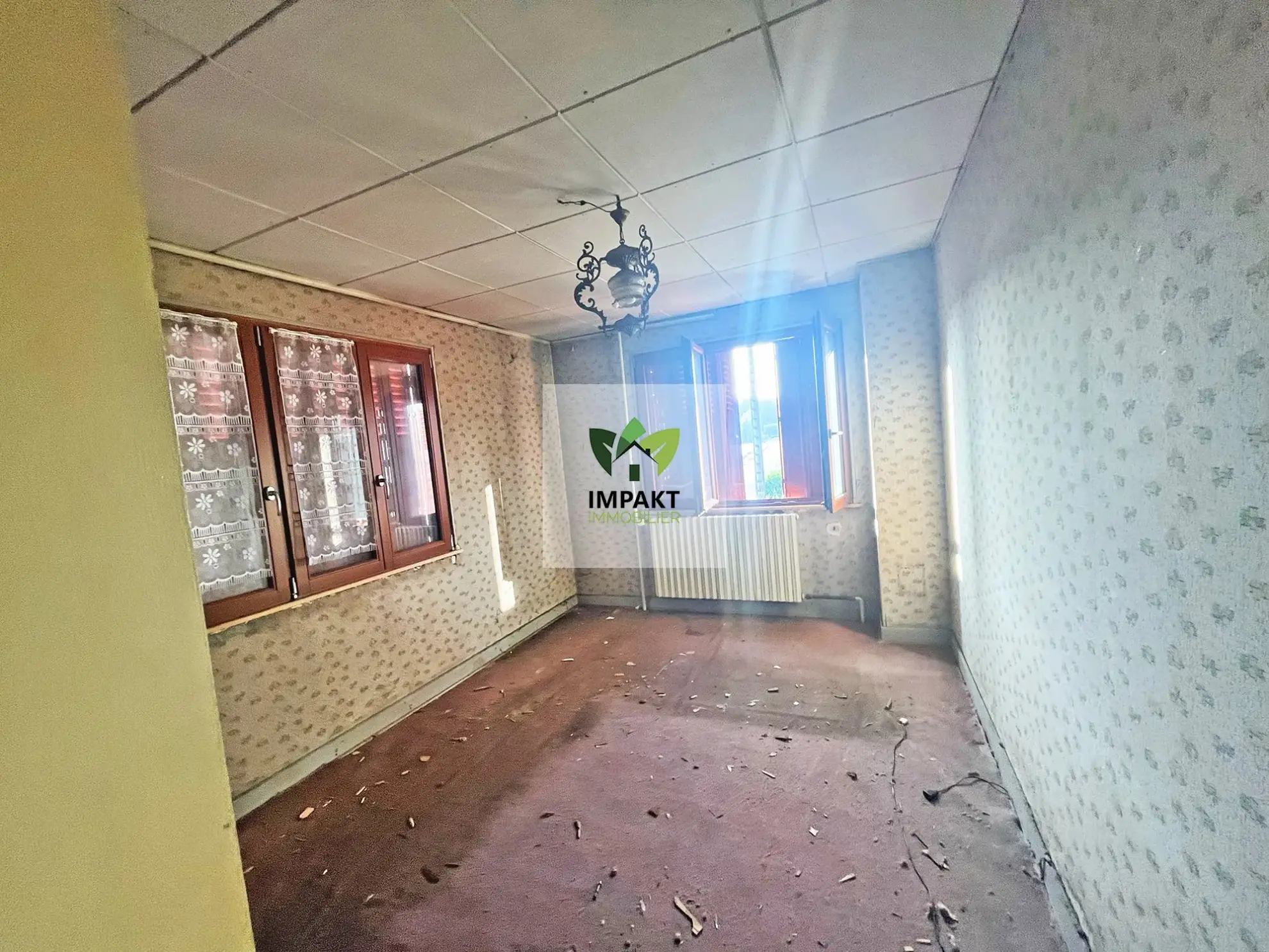 Maison à rénover avec grand garage et potentiel professionnel à Ronchamp 