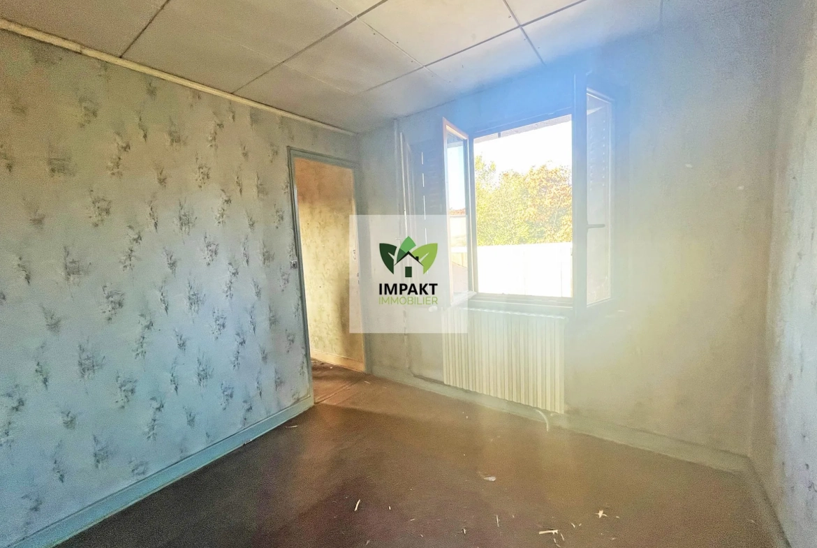Maison à rénover avec grand garage et potentiel professionnel à Ronchamp 