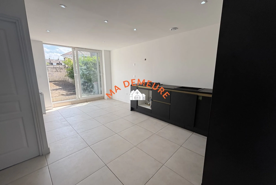 Maison rénovée de 88 m² avec terrasse et jardin à Lys-Lez-Lannoy 
