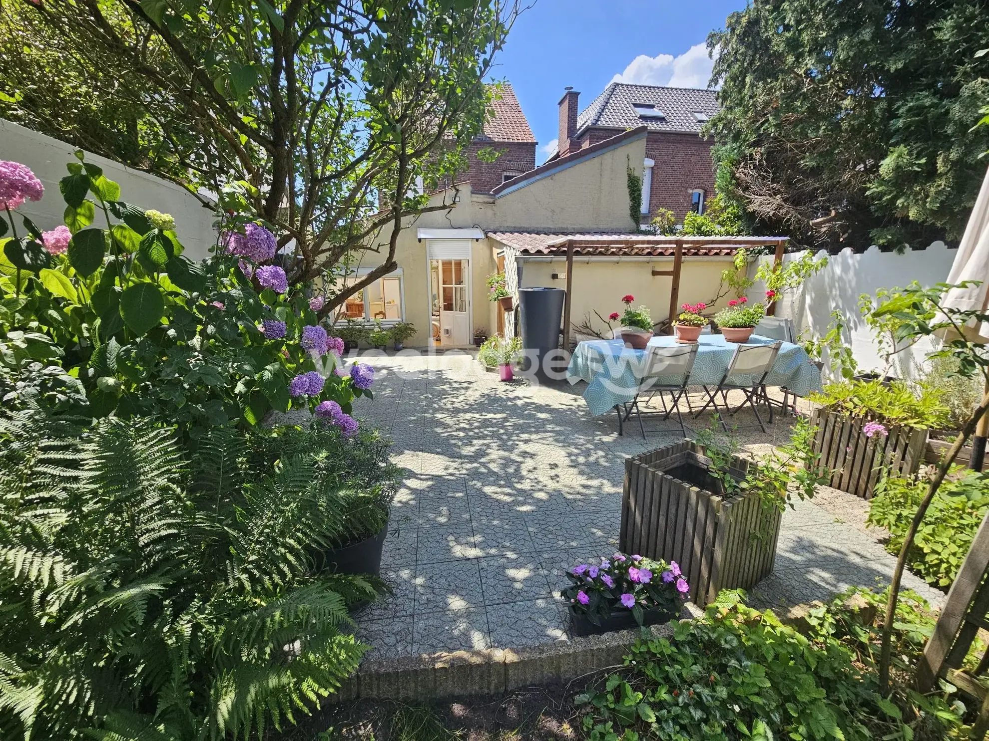 Maison individuelle à Onnaing avec grand potentiel et jardin clos 