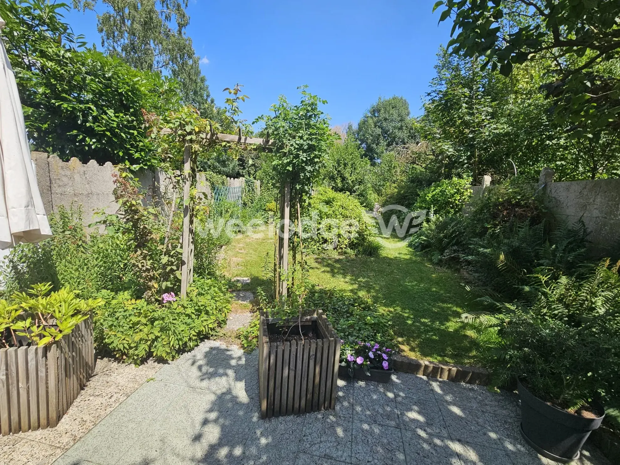 Maison individuelle à Onnaing avec grand potentiel et jardin clos 