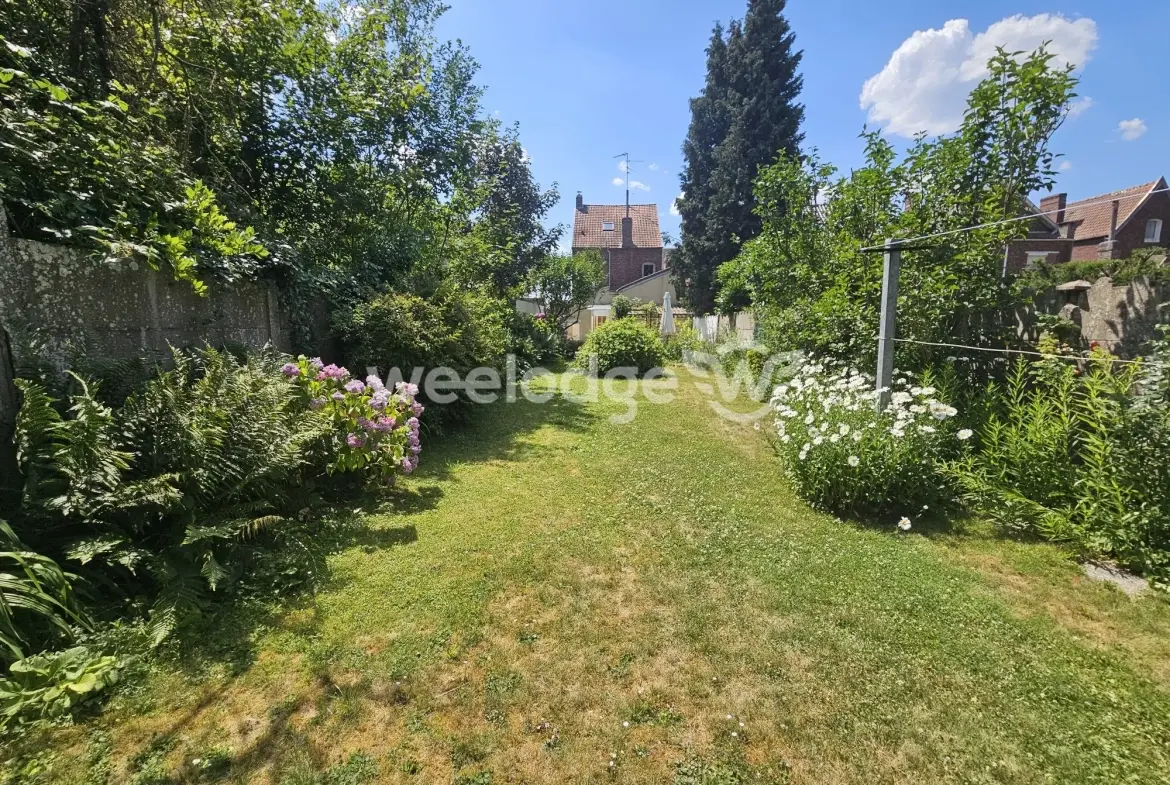 Maison individuelle à Onnaing avec grand potentiel et jardin clos 