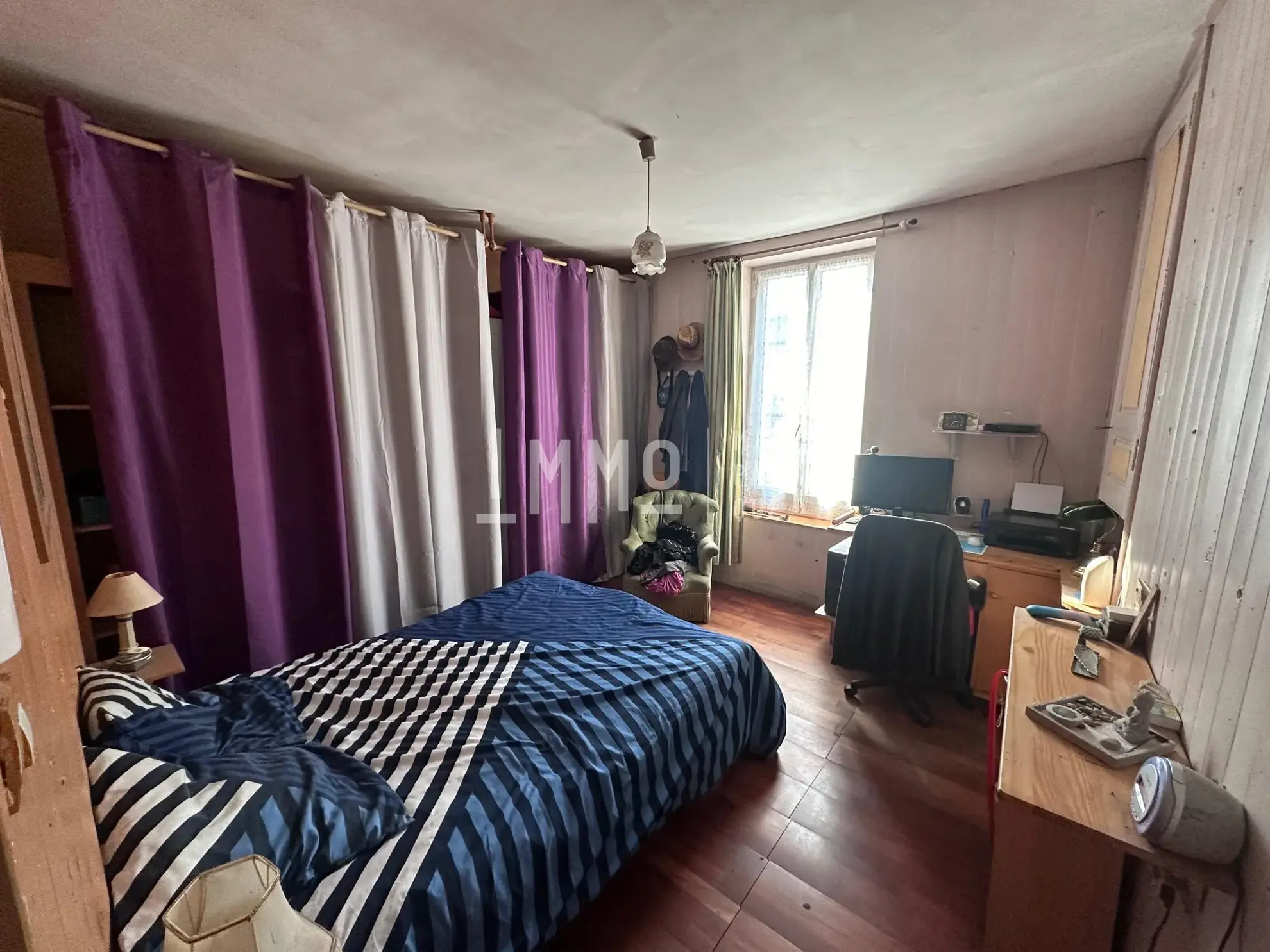 Maison à rénover avec jardin au centre du Lude, potentiel locatif de 7 % 