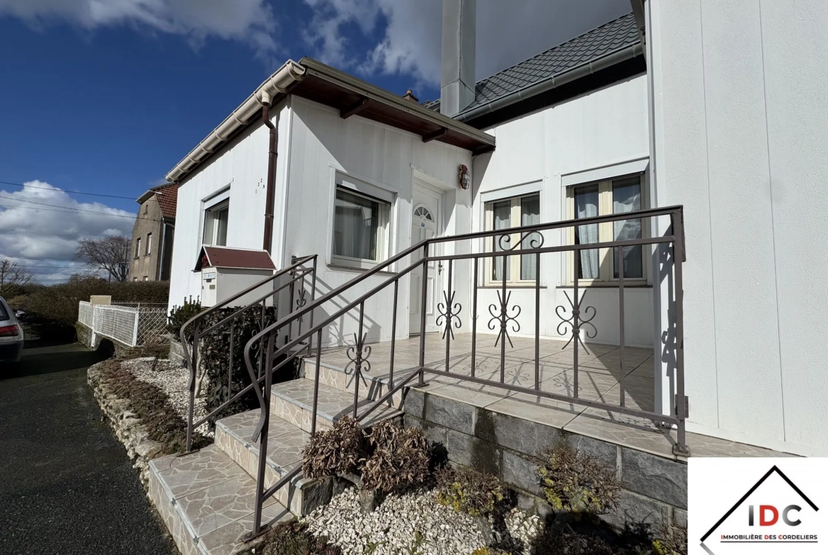 Charmante maison de village à Sarrebourg avec véranda et garage 