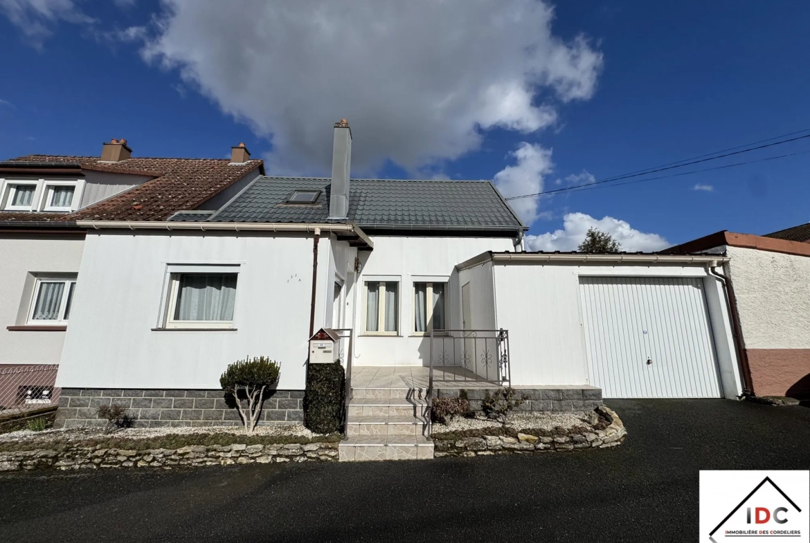 Charmante maison de village à Sarrebourg avec véranda et garage 