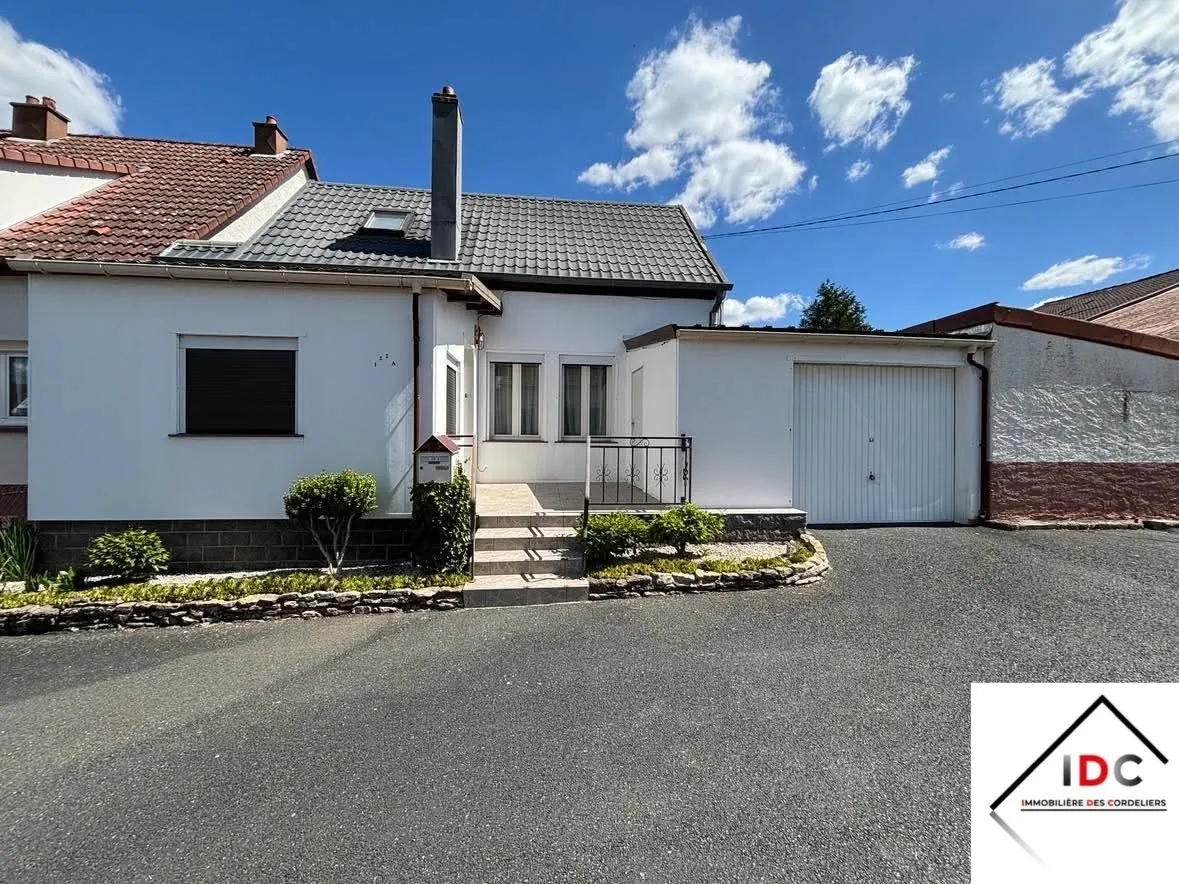 Charmante maison de village à Sarrebourg avec véranda et garage 