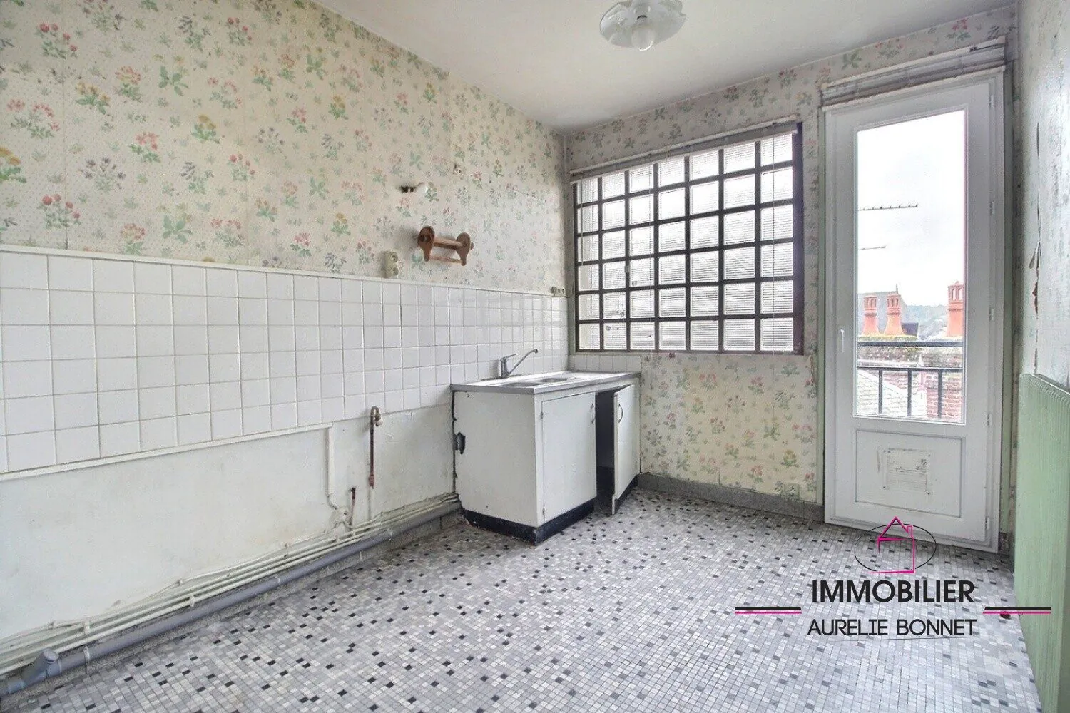 Appartement 3 pièces avec balcon et cave au centre de Lisieux 