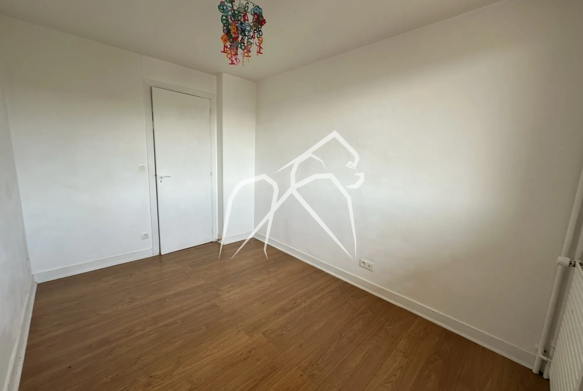 Appartement 4 pièces avec balcon à Sotteville-lès-Rouen – Quartier central et pratique 