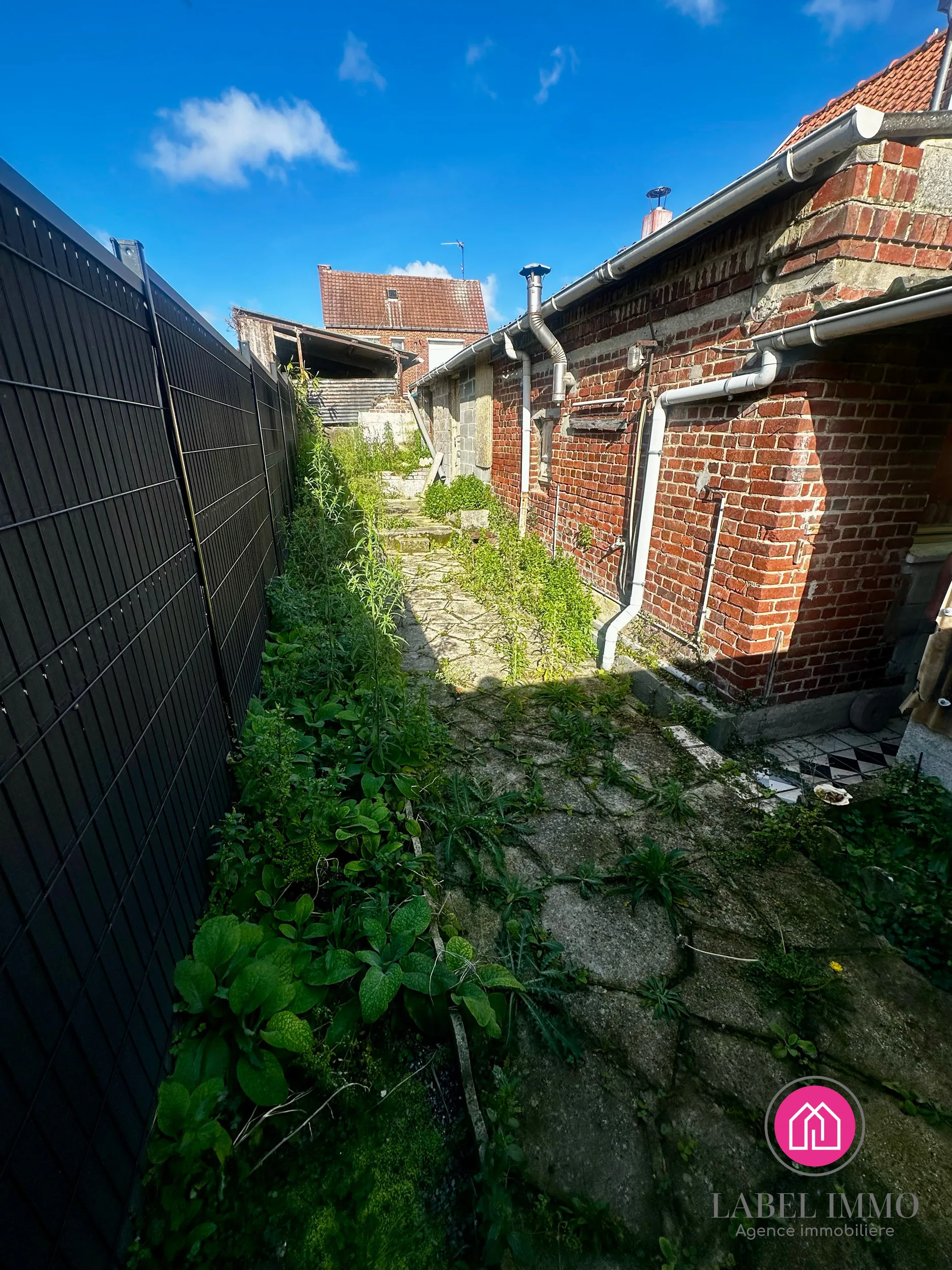Maison semi-individuelle à rénover à Marquette-en-Ostrevant - Opportunité à saisir 