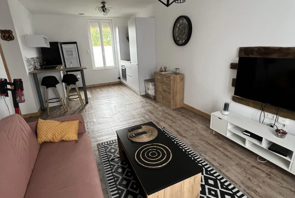 Maison ancienne divisée en 3 appartements avec jardin à Villemurlin 