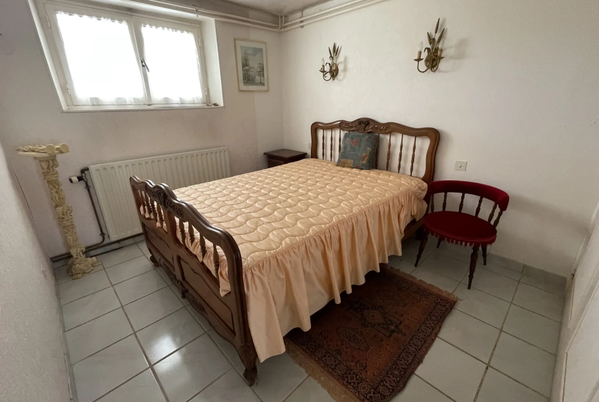 Maison de 110 m² avec véranda, garage et terrain à Malemort 