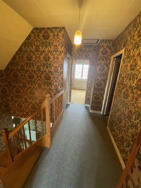 Maison à vendre à Saint-Cosme-en-Vairais avec belles volumes et potentiel de rénovation 