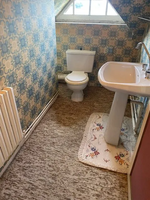 Maison à vendre à Saint-Cosme-en-Vairais avec belles volumes et potentiel de rénovation 