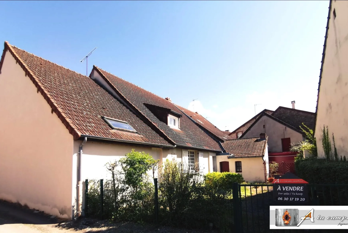 Charmante maison de village avec garage, jardin et cour à Sannat 