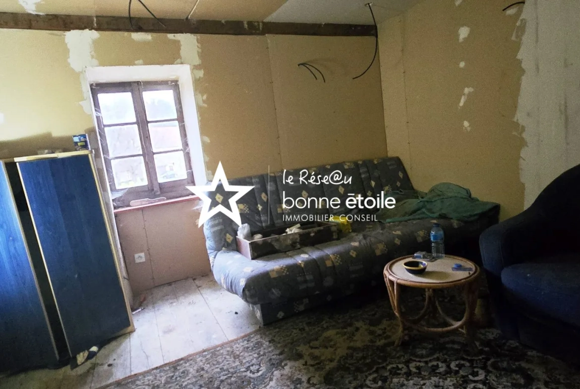 Maison en pierre à rénover à Noidant-le-Rocheux proche de Langres avec dépendances 