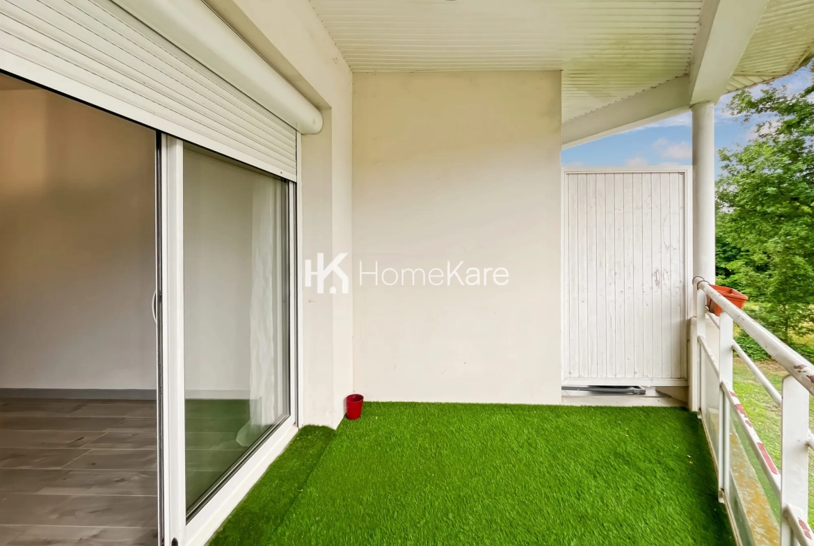 Appartement T2 à Rouffiac-Tolosan avec balcon, parking et proximité commerces 