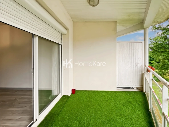 Appartement T2 à Rouffiac-Tolosan avec balcon, parking et proximité commerces