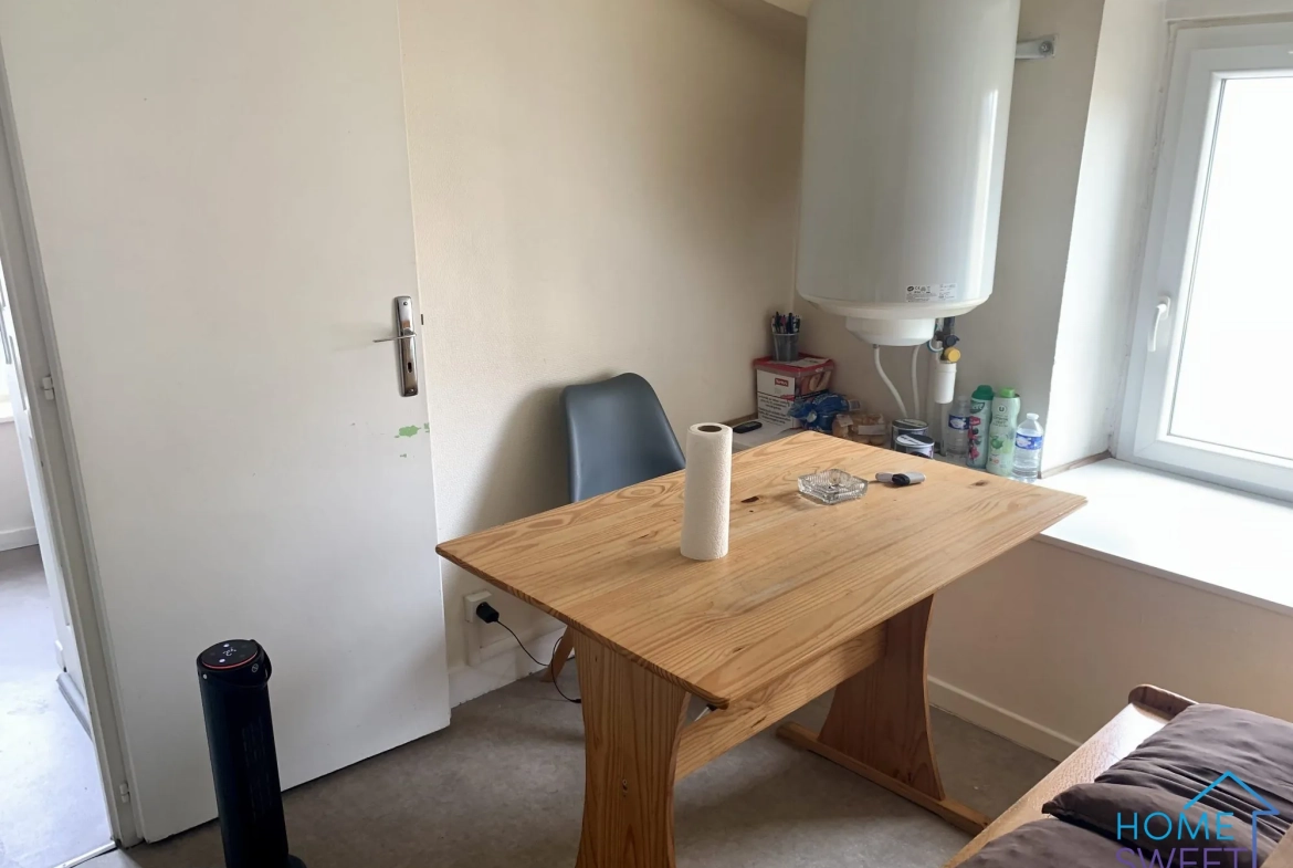 Immeuble de rapport à Sandillon avec local commercial et appartement loué 