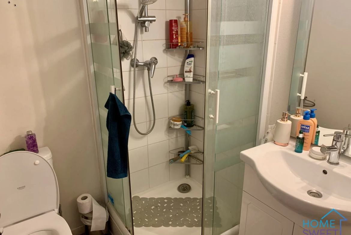 Immeuble de rapport à Sandillon avec local commercial et appartement loué 