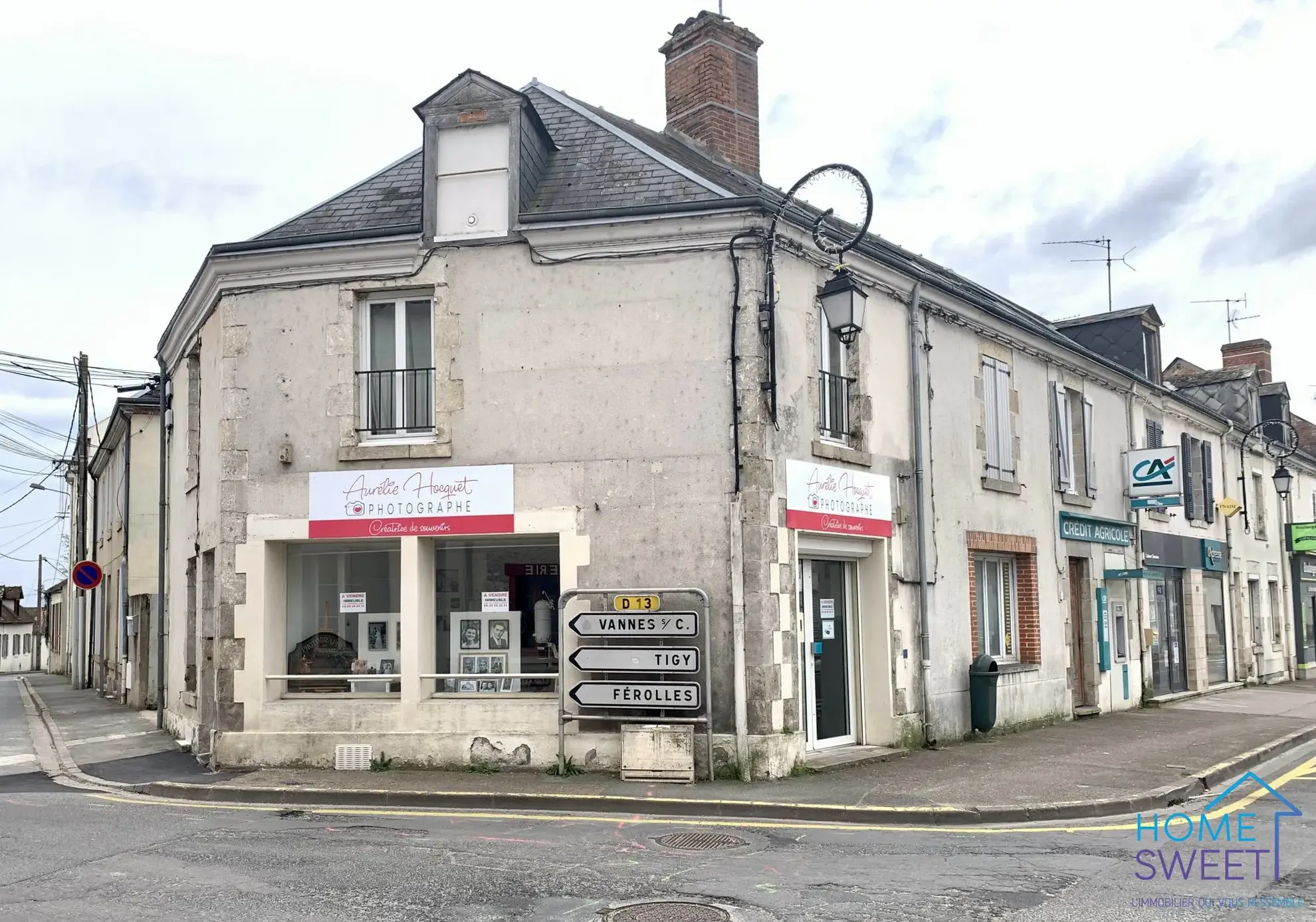 Immeuble de rapport à Sandillon avec local commercial et appartement loué 