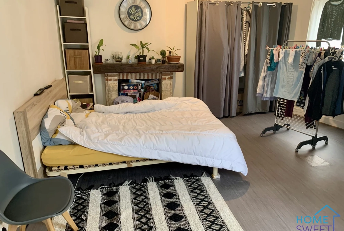 Immeuble de rapport à Sandillon avec local commercial et appartement loué 