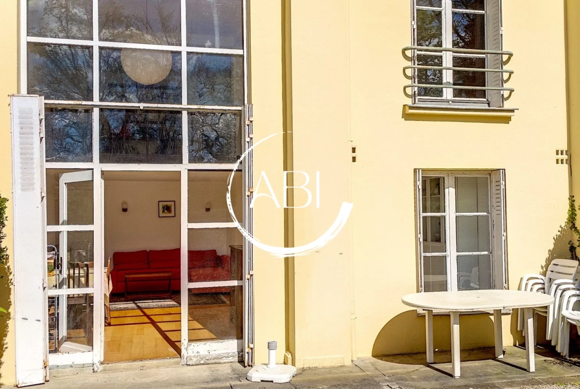 Appartement à vendre à Bagnoles de l'Orne avec jardin privé et stationnement 