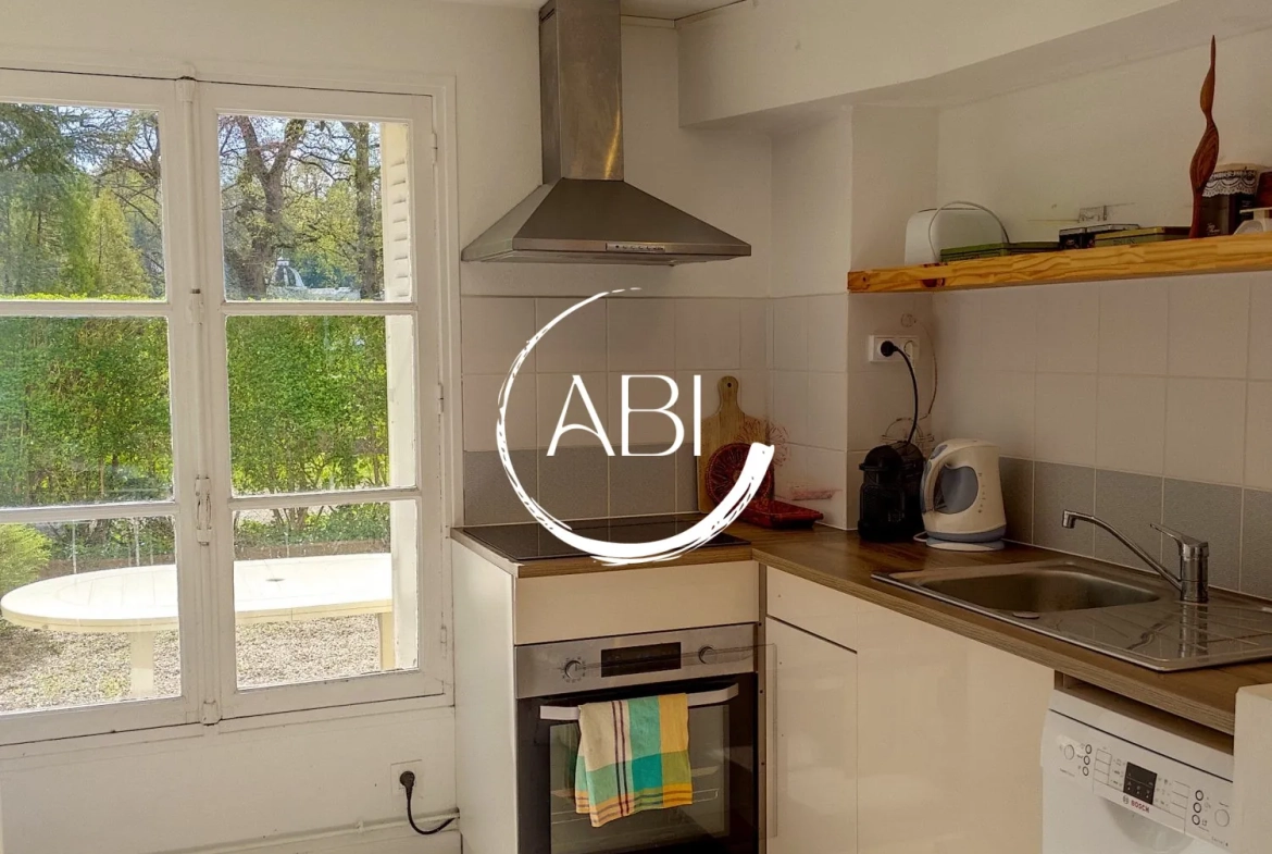 Appartement à vendre à Bagnoles de l'Orne avec jardin privé et stationnement 