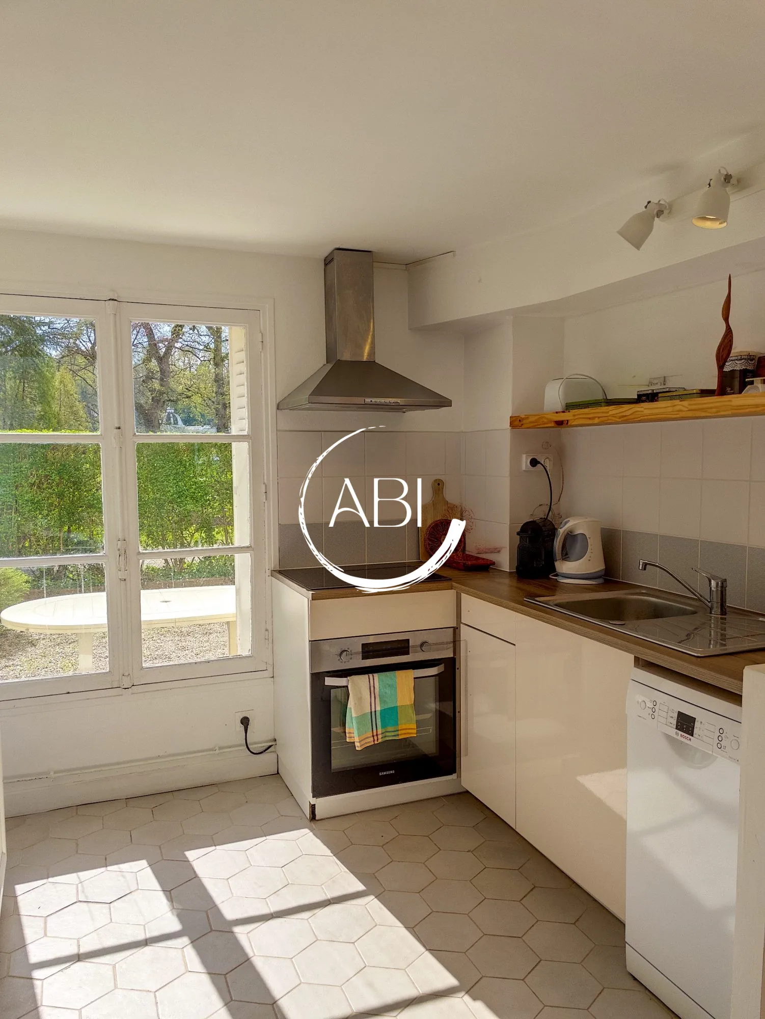 Appartement à vendre à Bagnoles de l'Orne avec jardin privé et stationnement 