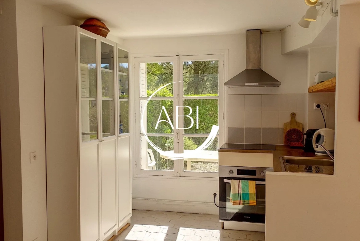 Appartement à vendre à Bagnoles de l'Orne avec jardin privé et stationnement 