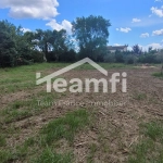 A vendre terrain plat constructible de 1175 m² avec garage à Saint-Julien-les-Rosiers