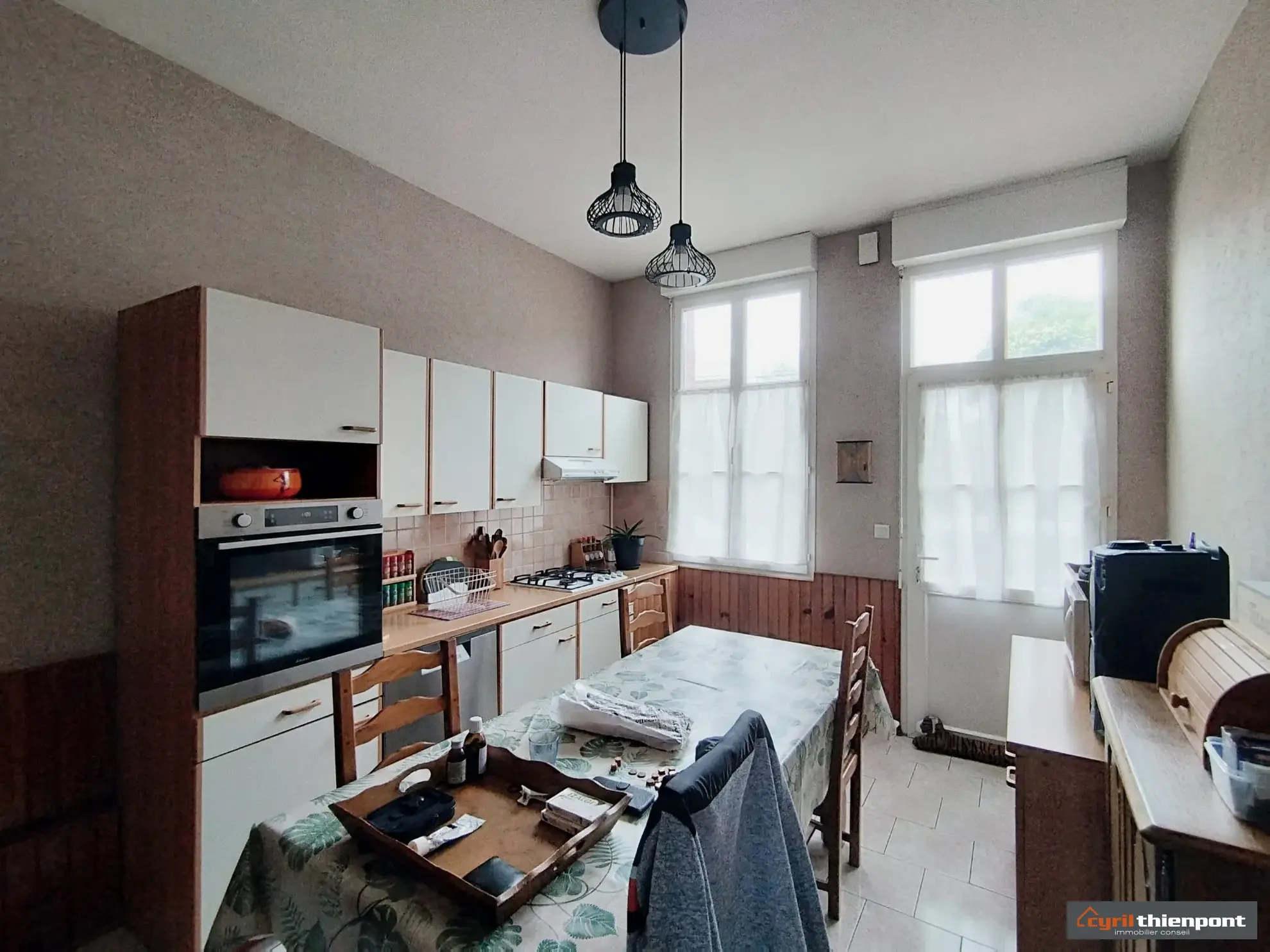Charmante maison de ville à Friville-Escarbotin avec garage, jardin et potentiel de rénovation 