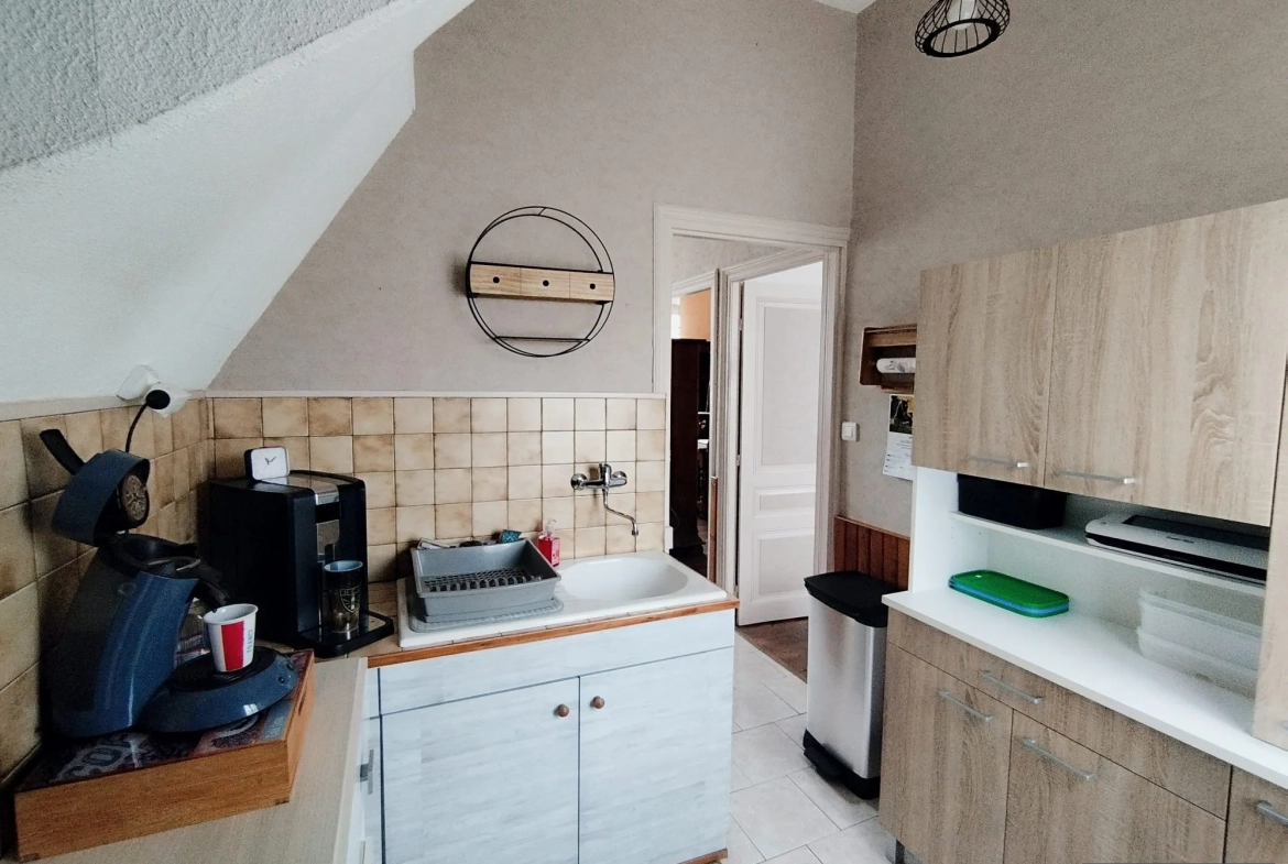 Charmante maison de ville à Friville-Escarbotin avec garage, jardin et potentiel de rénovation 
