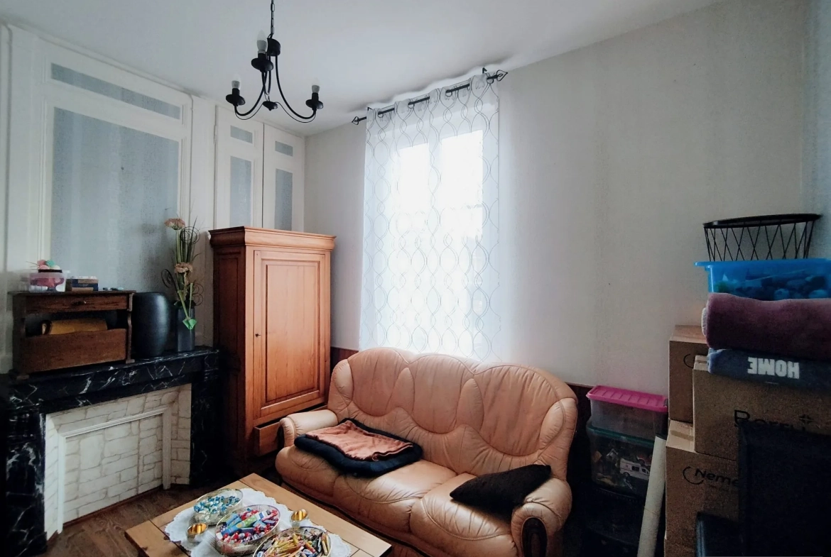 Charmante maison de ville à Friville-Escarbotin avec garage, jardin et potentiel de rénovation 
