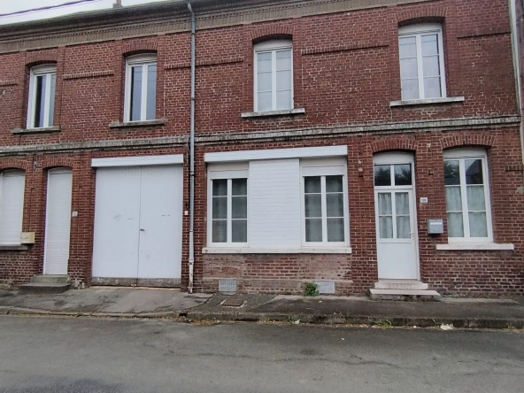 Charmante maison de ville à Friville-Escarbotin avec garage, jardin et potentiel de rénovation