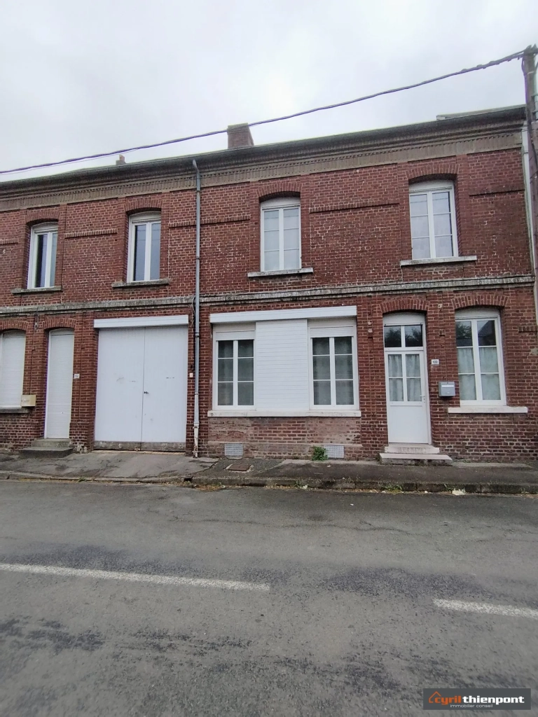 Charmante maison de ville à Friville-Escarbotin avec garage, jardin et potentiel de rénovation