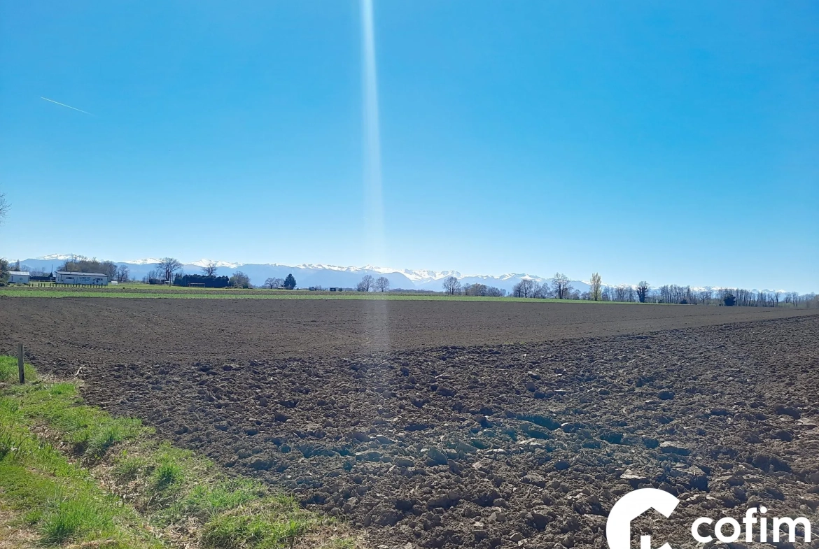 Terrain constructible de 1487 m² à Luquet, vue Pyrénées, proche commodités 