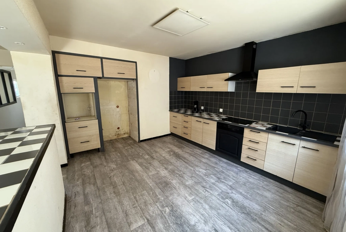 Maison de 147 m² avec grand garage et jardin en vente à Clermont l'Hérault 