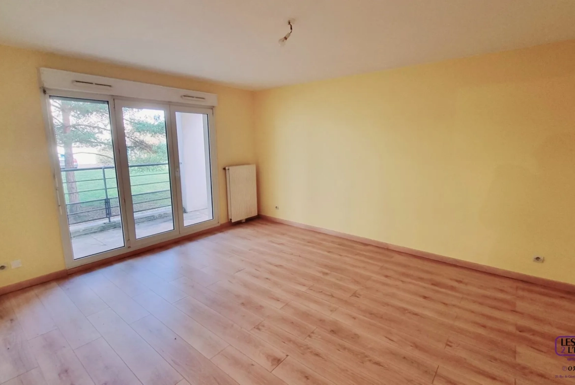 Appartement F2 à Metz Sablon avec terrasse, parking en sous-sol, environnement calme 