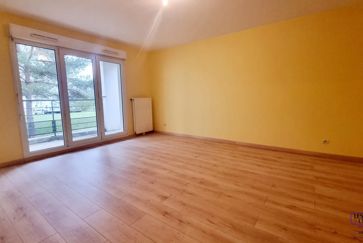 Appartement F2 à Metz Sablon avec terrasse, parking en sous-sol, environnement calme 