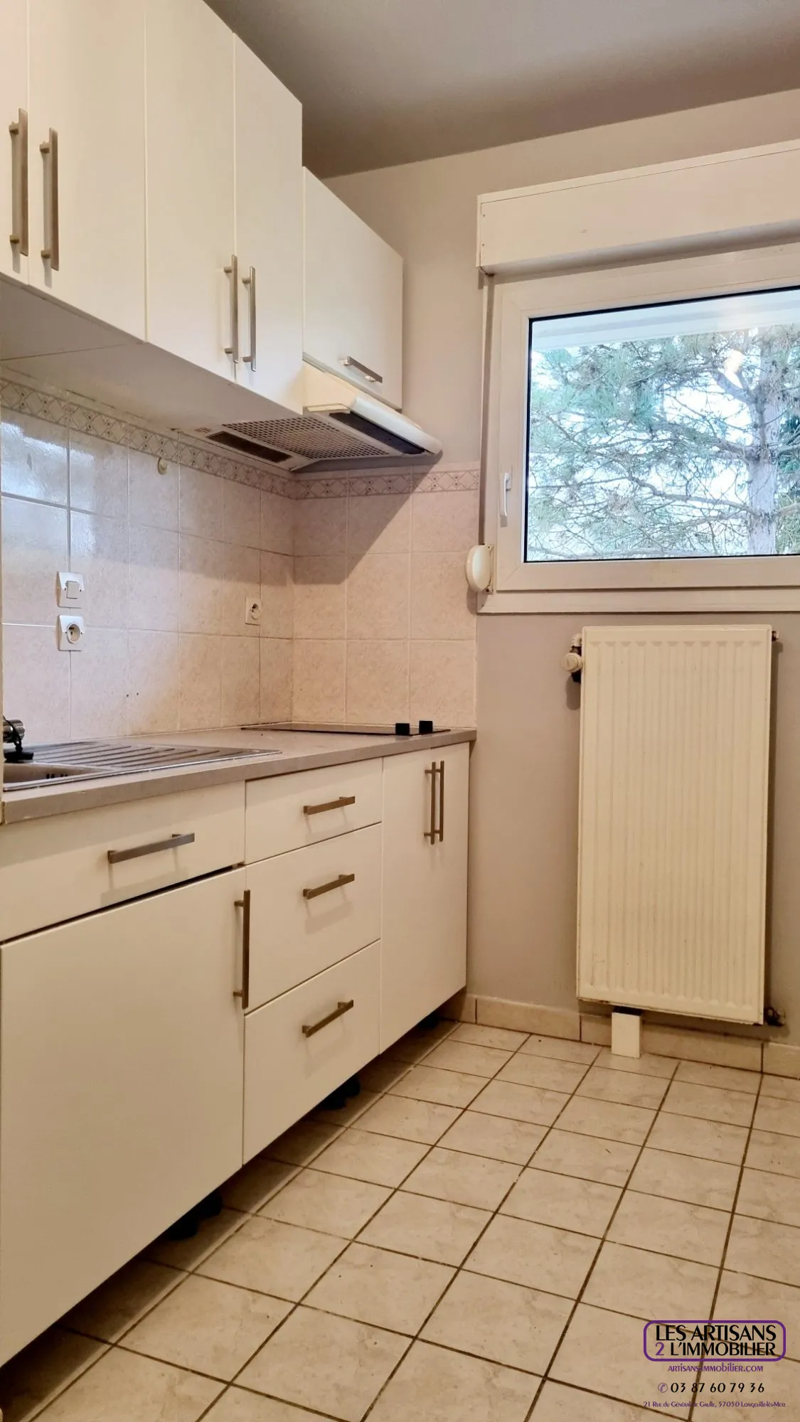 Appartement F2 à Metz Sablon avec terrasse, parking en sous-sol, environnement calme 