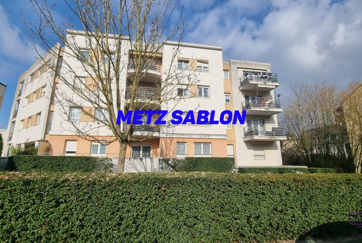 Appartement F2 à Metz Sablon avec terrasse, parking en sous-sol, environnement calme 
