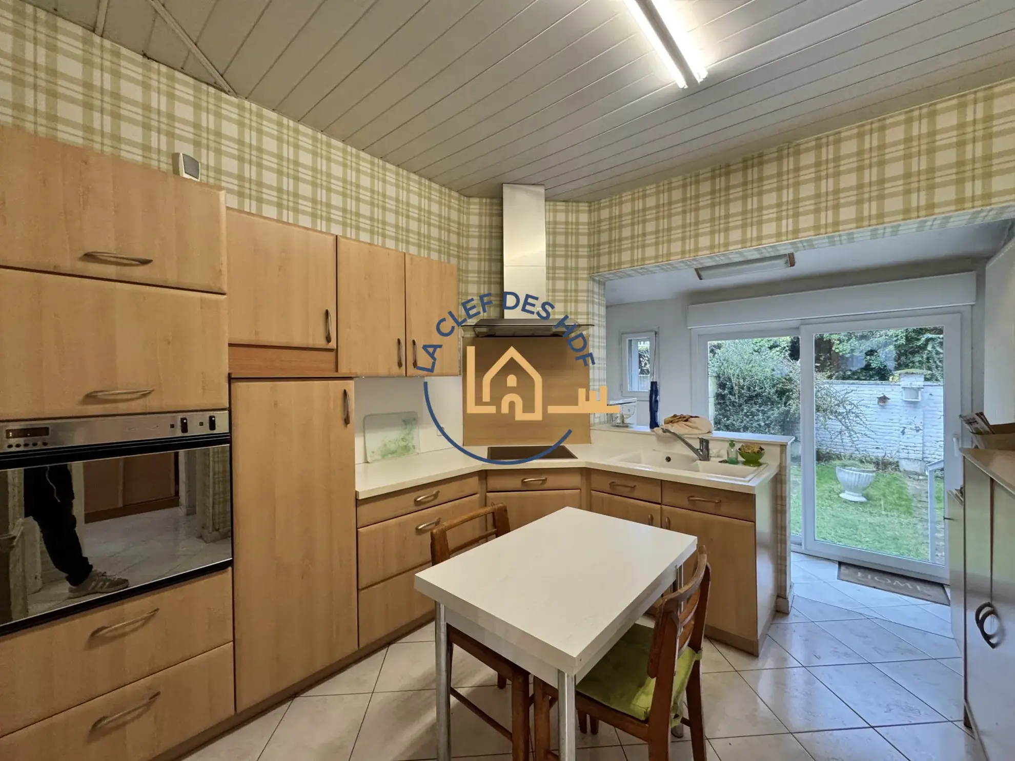 Maison à vendre à Lens 62300 avec jardin et potentiel rénové 