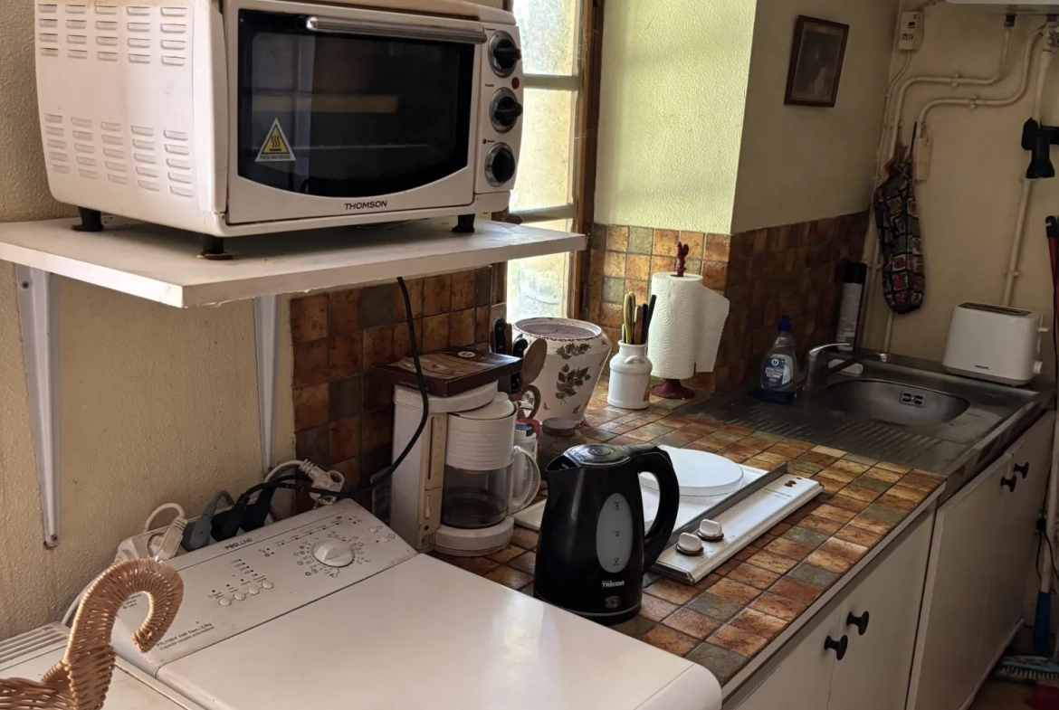 Maison ancienne de 40 m² à Sillé-le-Guillaume avec terrasse et jardin, à personnaliser 